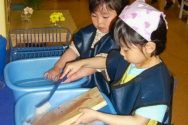 Students washing dishes